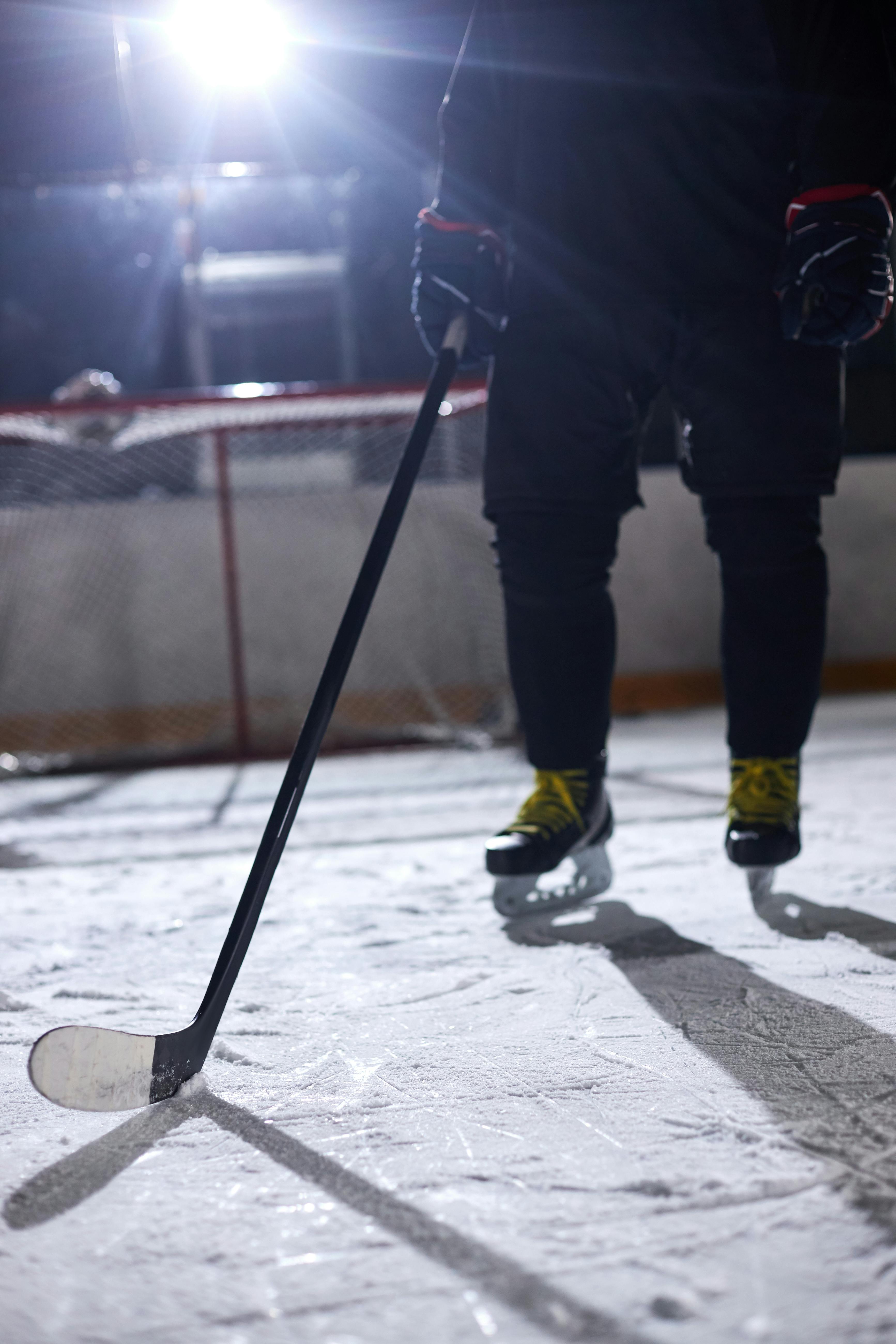 Hockey player standing on the ice 