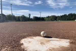 Baseball and mint on court