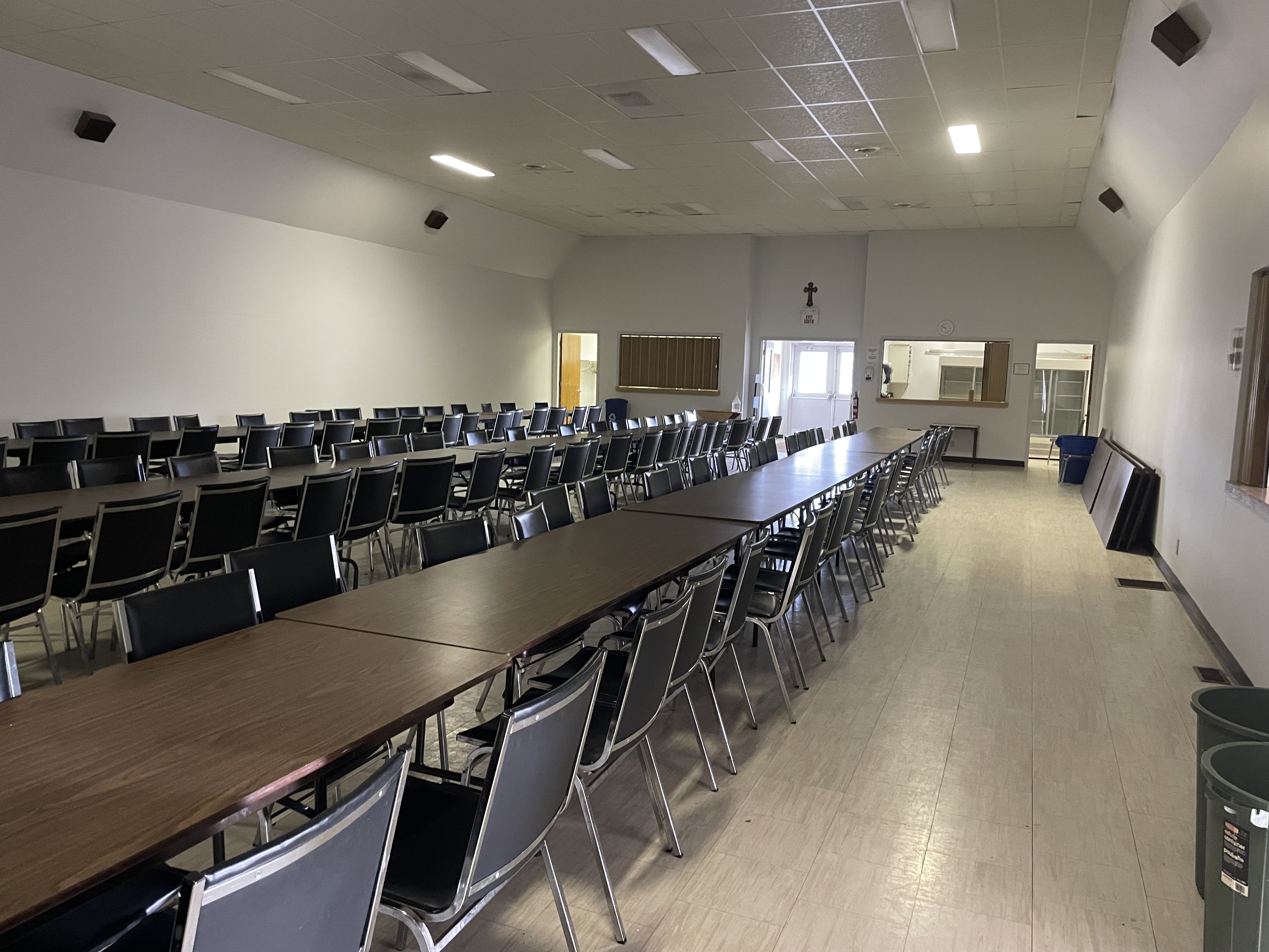 The Curran Forum with rectangular tables lined up 