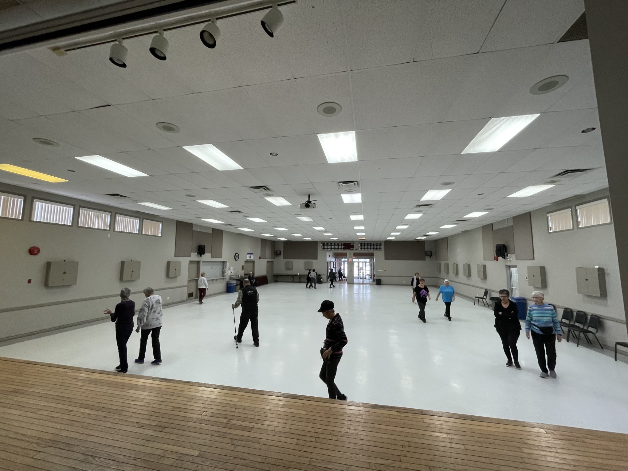 women walking in the community centre