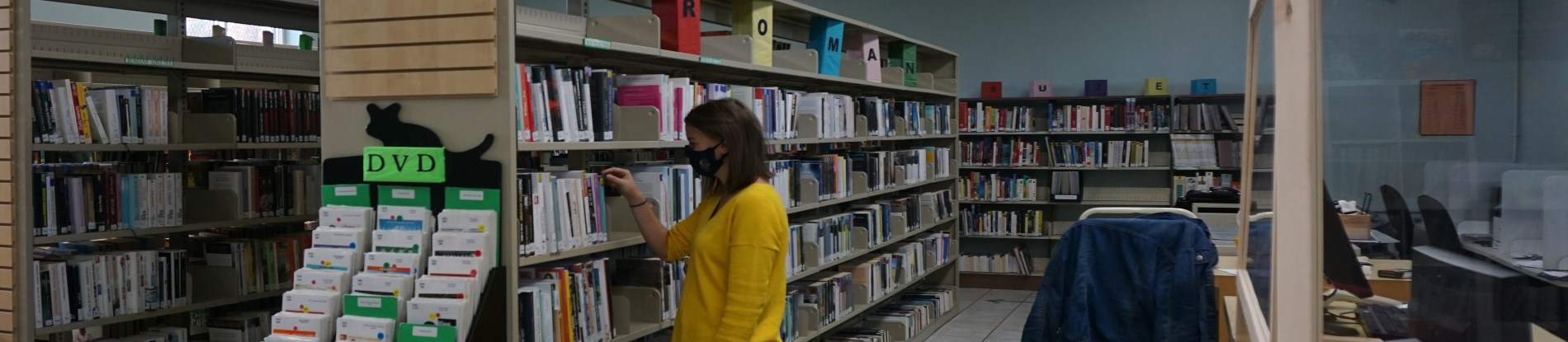 woman looking at books 