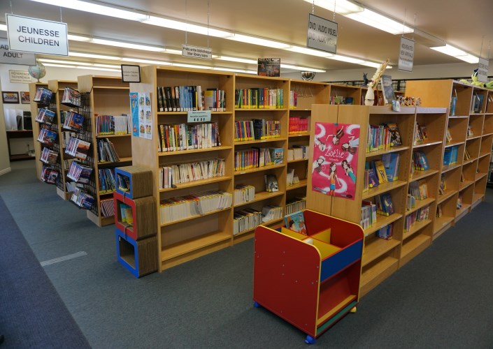 three shelves with books