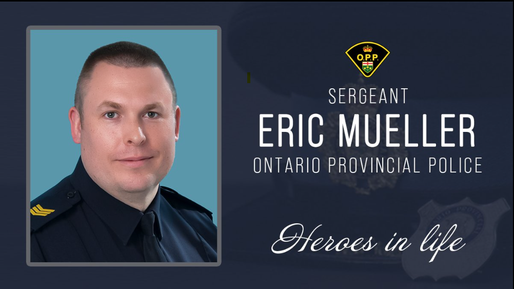 Portrait of Sergeant Eric Mueller with the words "heroes in life"