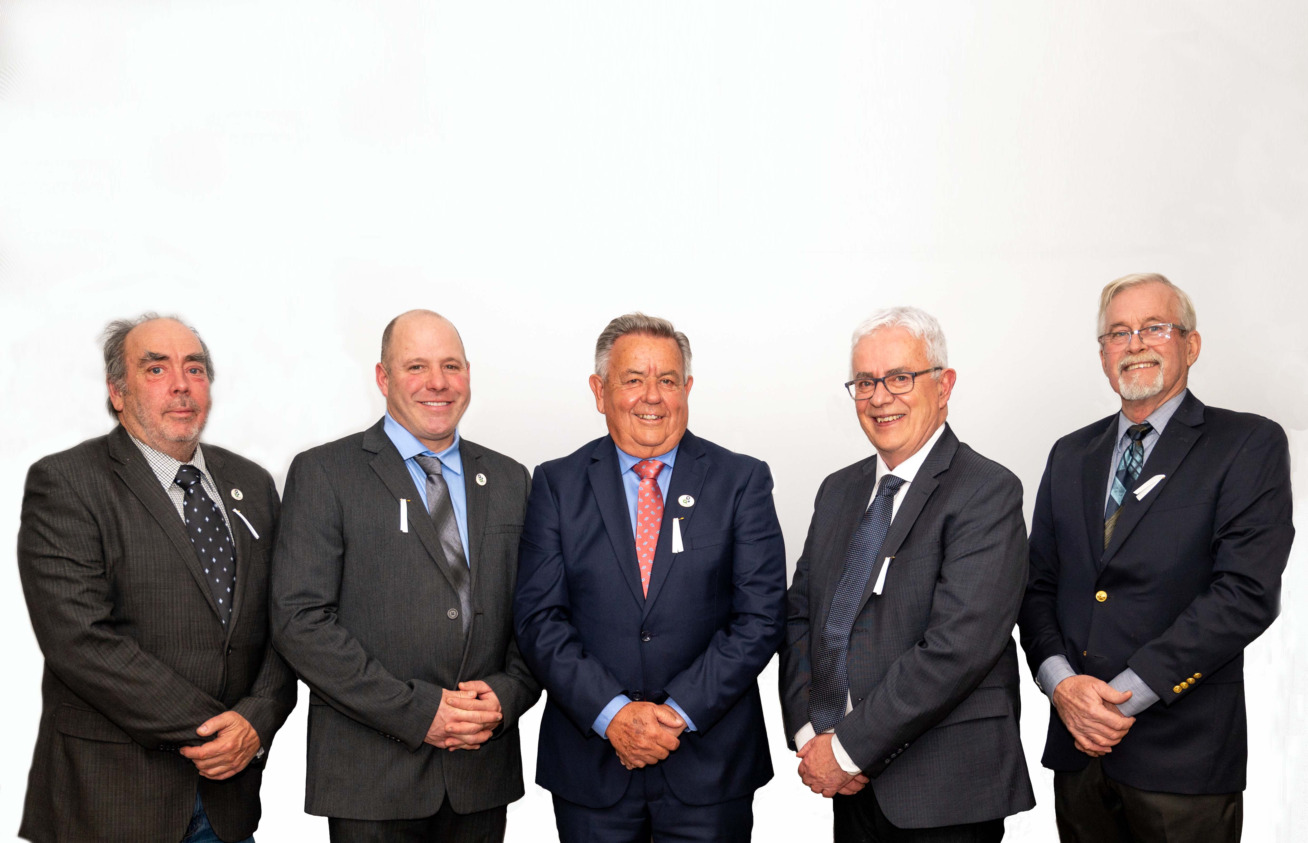 Members of council standing in front of town hall