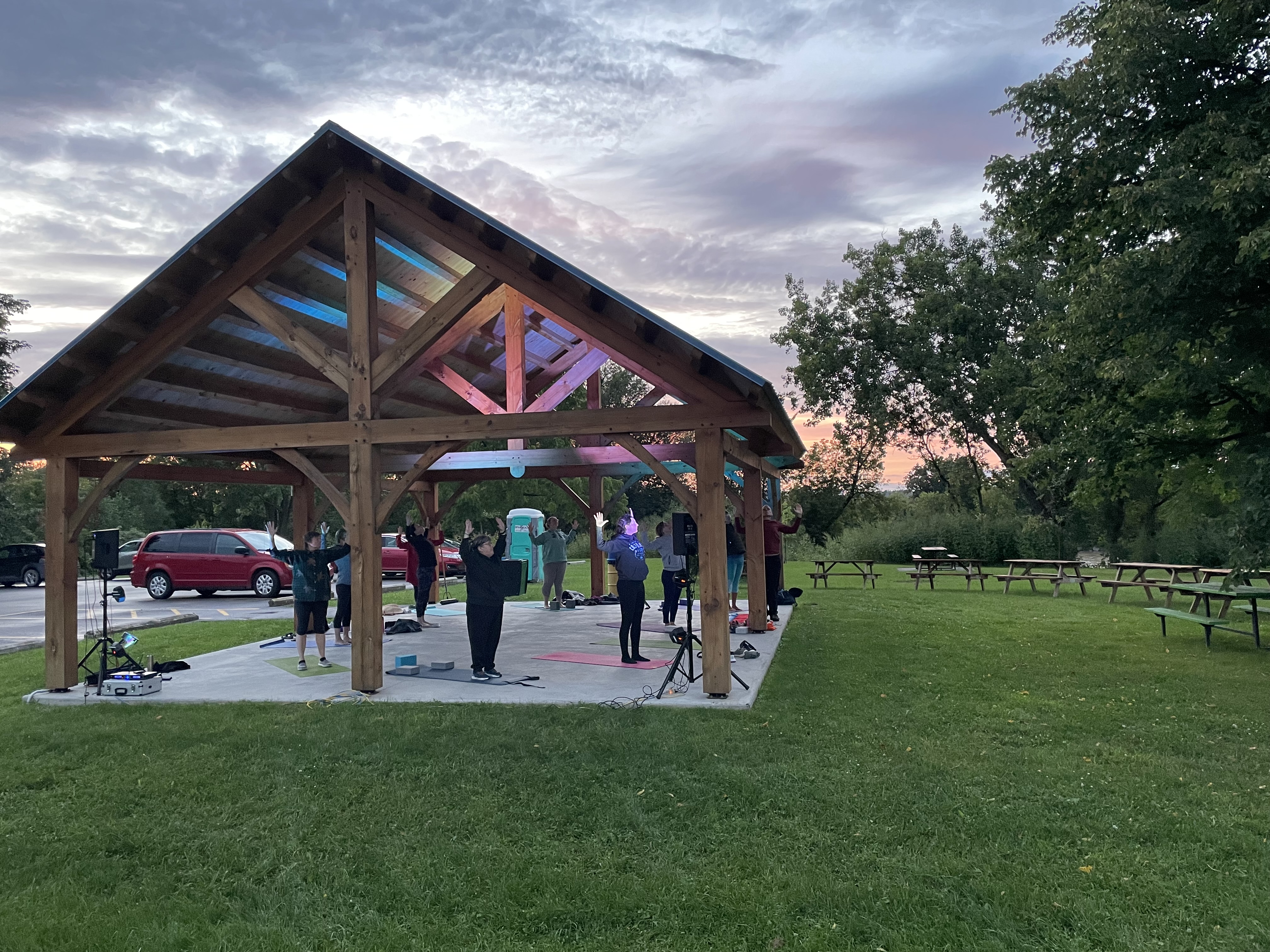 Group of people doing yoga in the Alfred Park in 2023