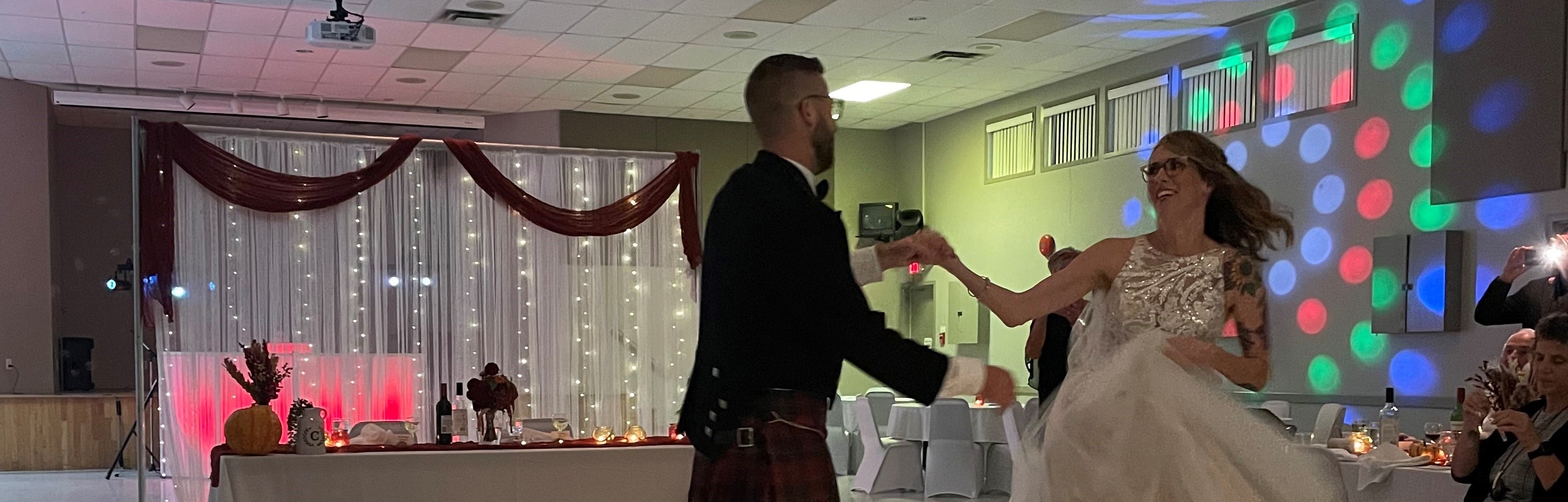 married couple dancing in the Wendover community hall