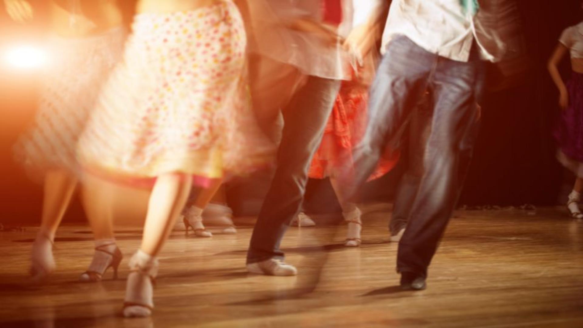 people dancing we can only view the bottom half of there body