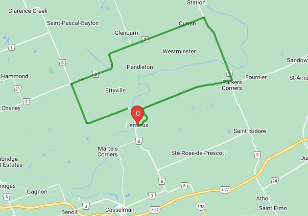 Map depicting a green outlined region with a red marker on a town labeled L'Orignal.